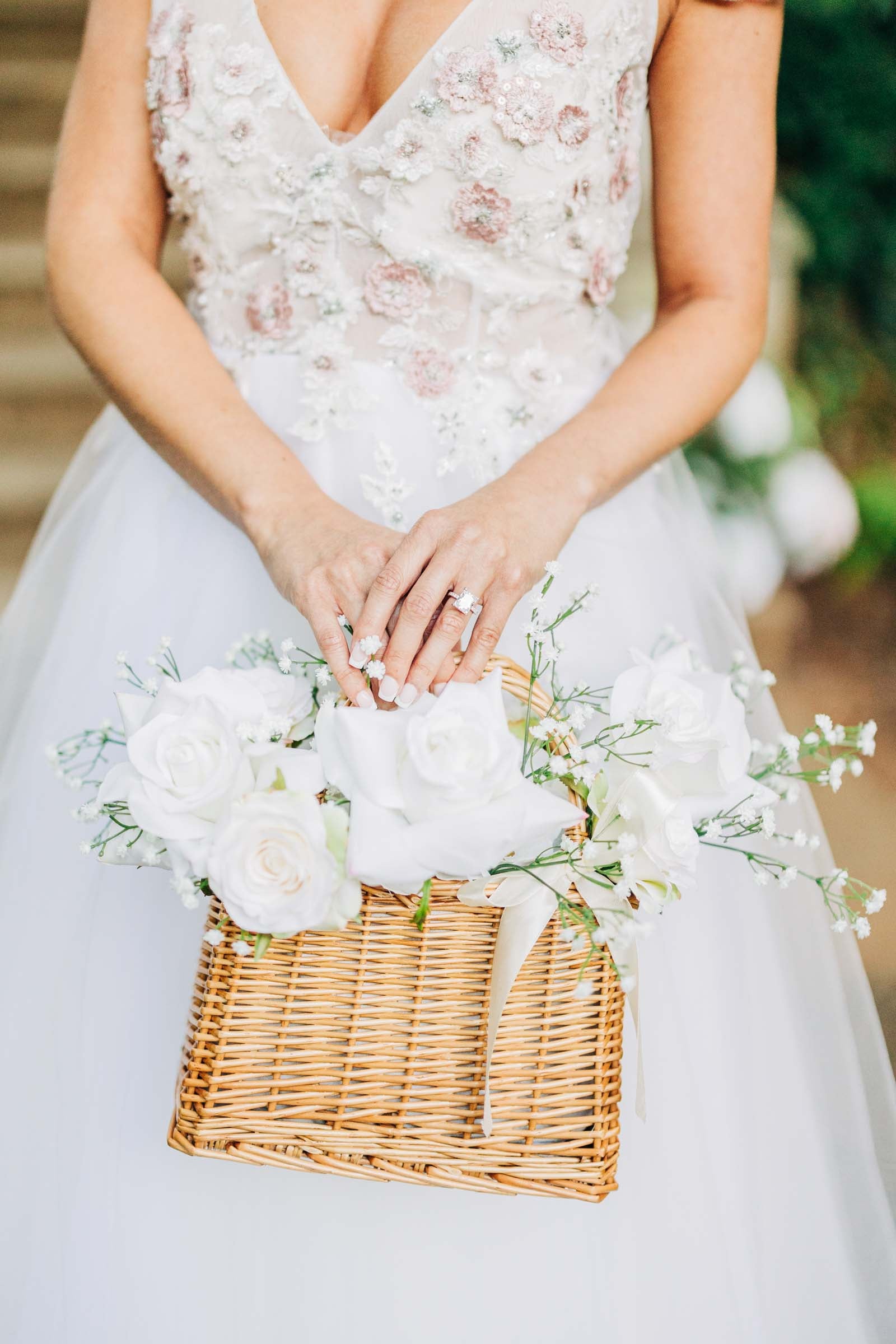 Bridesmaid floral basket featuring full faux blooms in coordinated wedding colors, ideal for rustic, garden, or summer inspired ceremonies.
