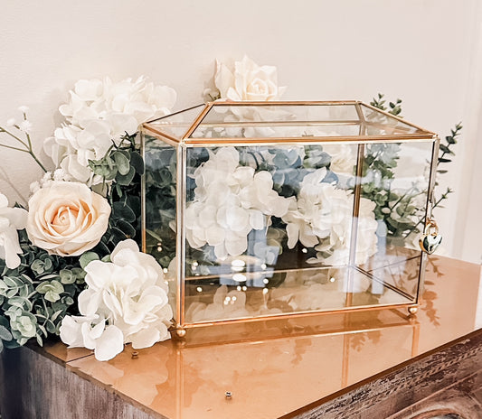 Clear glass card box with gold framing, a chic and secure option for guests to drop wedding cards at your reception.