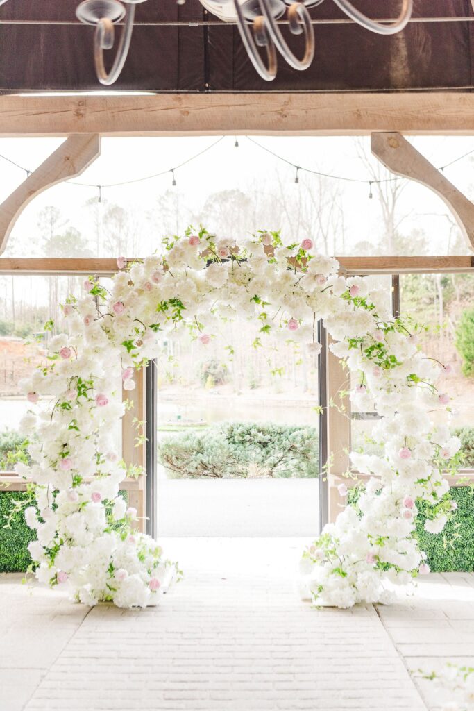 The Meadow Arch — faux floral wedding arch rental by September Tree
