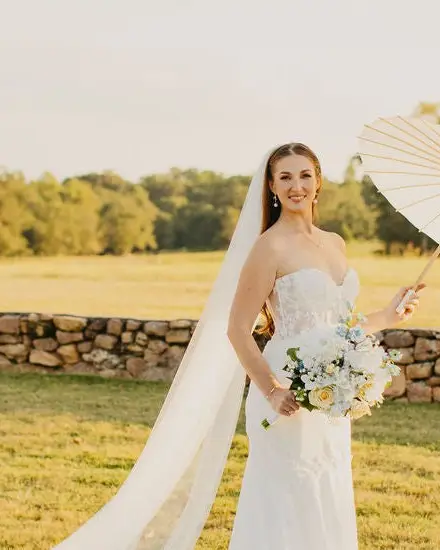 Bride holding the Anastasia Bridal Bouquet — real-touch faux bridal bouquet by September Tree